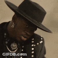 Man In Black Hat And Black Jacket With Stars Smiling GIF