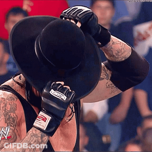 Man In Black Hat And Boxing Gloves GIF