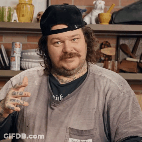 Man In Black Hat And Grey Shirt Saying Sick GIF