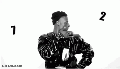 Man In Black Hat And Jacket Dancing GIF