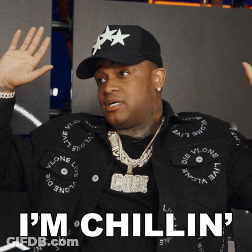 Man In Black Hat And Jacket Saying I'm Chillin GIF
