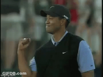 Man In Black Hat And Nike Vest Raising Fist GIF