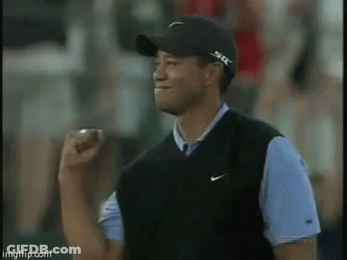 Man In Black Hat And Nike Vest Raising Fist GIF