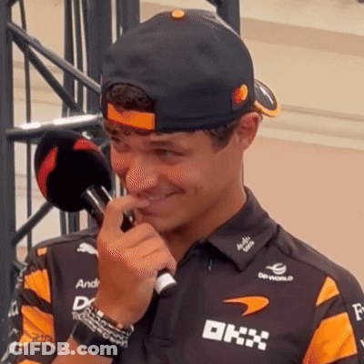 Man In Black Hat And Orange Shirt With DHX GIF