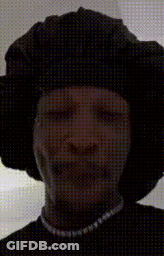Man In Black Hat And Pearl Necklace Crying GIF