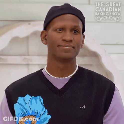 Man In Black Hat And Purple Shirt With Great Canadian Baking Show GIF