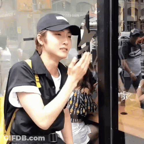 Man In Black Hat At McDonald's Window GIF