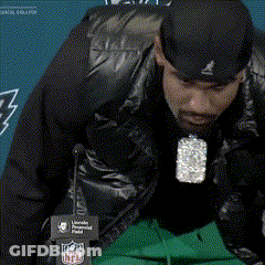 Man In Black Hat At NFL Logo GIF
