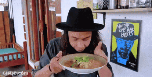 Man In Black Hat Eating Soup GIF