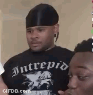 Man In Black Hat Next To Man In Black Shirt GIF