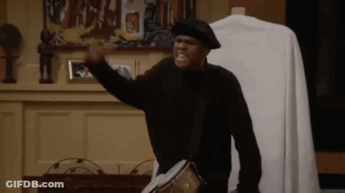 Man In Black Hat Playing Drum Making Funny Face GIF