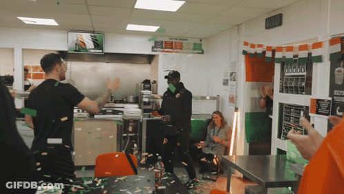 Man In Black Hat Saying Eat The Rainbow GIF