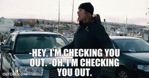 Man In Black Hat Talking To Car GIF