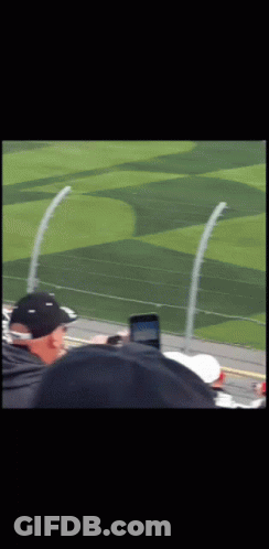 Man In Black Hat Watching Race GIF