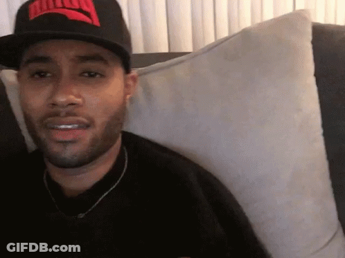 Man In Black Hat With Red Puma Logo GIF