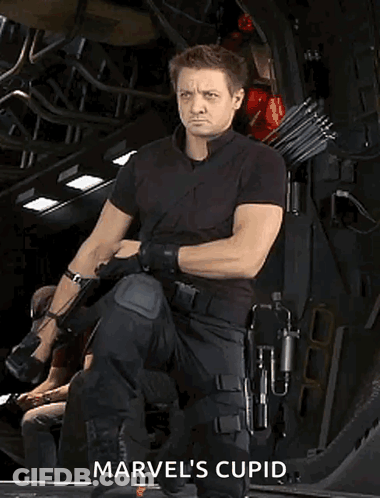 Man In Black Holding Bow Saying Marvel's Cupid GIF