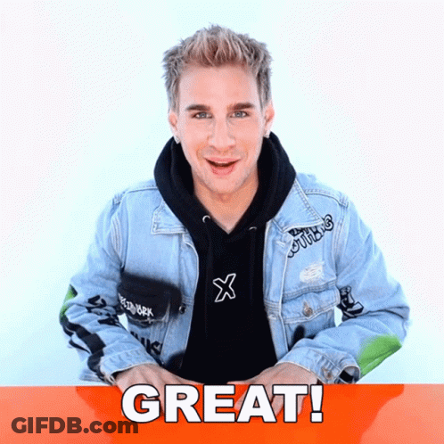 Man In Black Hoodie And Blue Denim Jacket In Front Of Great Sign GIF
