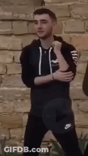 Man In Black Hoodie And Pants Arms Crossed GIF