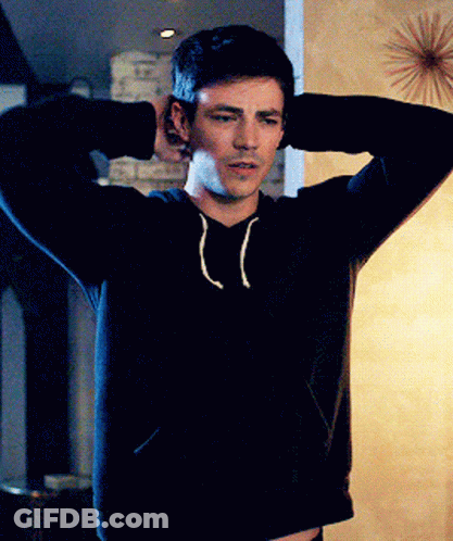 Man In Black Hoodie Holding Hands Behind Head GIF