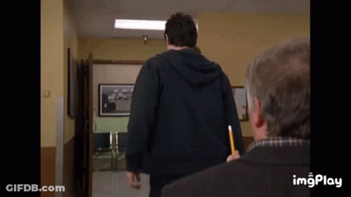 Man In Black Hoodie Holding Pencil GIF