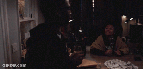 Man In Black Hoodie Holding Wine GIF