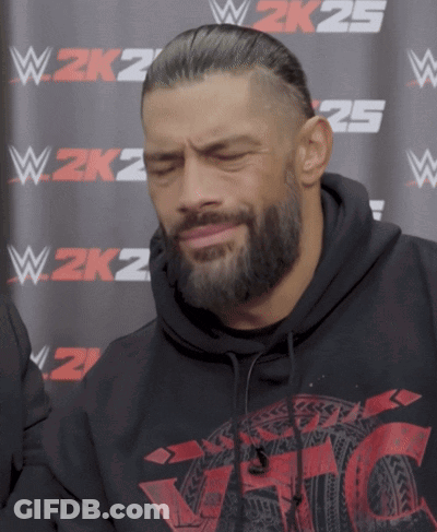 Man In Black Hoodie In Front Of W2K25 Sign GIF