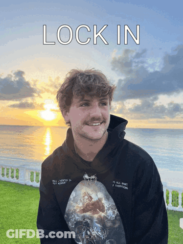 Man In Black Hoodie Lock In Above Ocean GIF