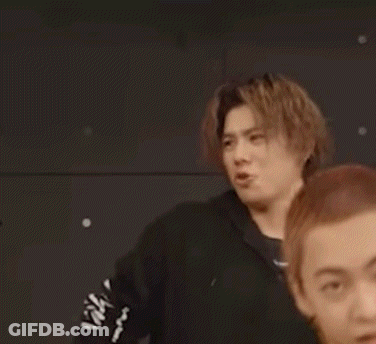 Man In Black Hoodie Making Funny Face Next To Man GIF