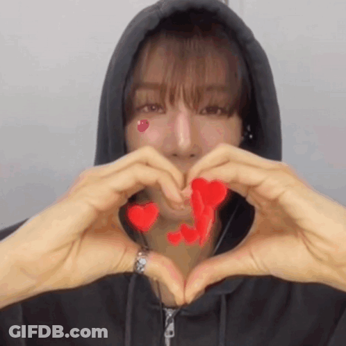 Man In Black Hoodie Making Heart Shape GIF