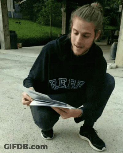 Man In Black Hoodie Saying Rebf Reading Book GIF