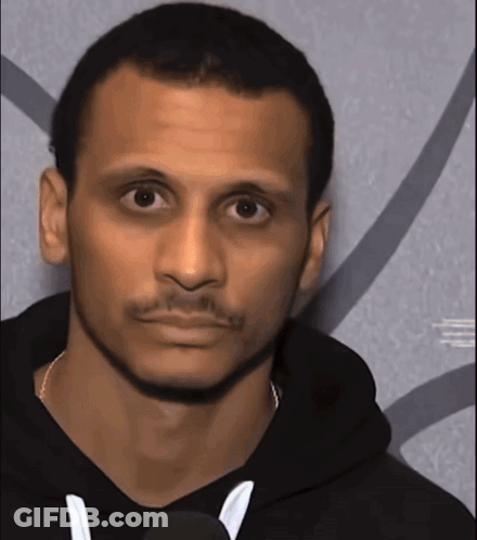 Man In Black Hoodie Serious Look GIF