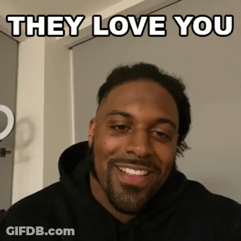 Man In Black Hoodie Smiling Saying They Love You GIF