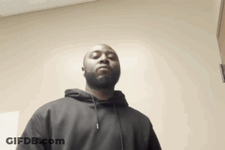 Man In Black Hoodie Standing GIF