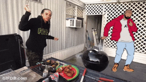 Man In Black Hoodie With Flow Next To Man In Red Jacket GIF