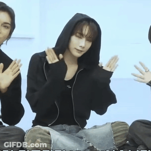 Man In Black Hoodie With Hands Up GIF
