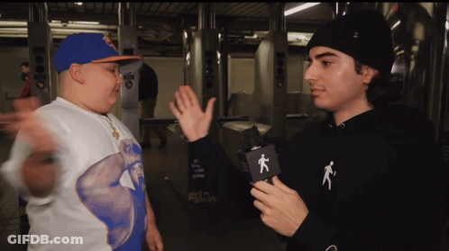 Man In Black Hoodie With Person Talking GIF