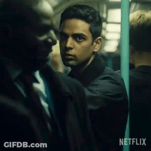 Man In Black Jacket And Another On Subway GIF