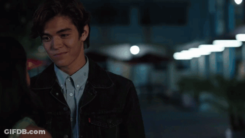 Man In Black Jacket And Blue Shirt With Letter S GIF