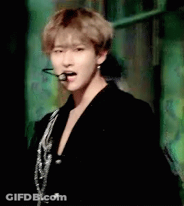 Man In Black Jacket And Earrings GIF