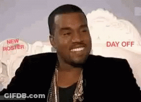Man In Black Jacket And Gold Chains Smiling Day Off GIF
