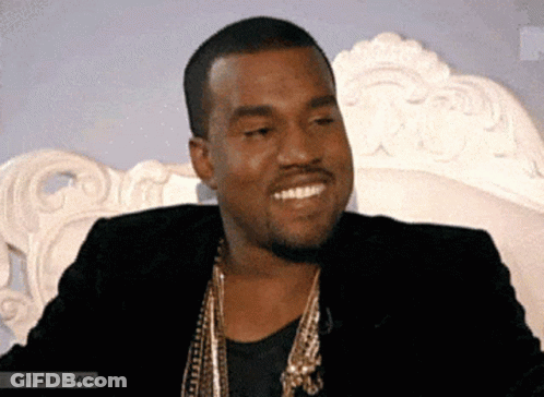 Man In Black Jacket And Gold Necklace Smiling GIF