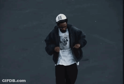 Man In Black Jacket And N.B.G. Hat GIF