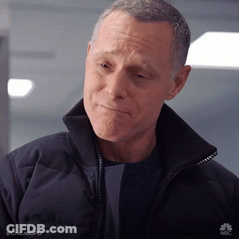 Man In Black Jacket And Sweater Making Funny Face GIF