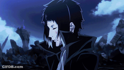 Man In Black Jacket And Tie Before Destroyed Building GIF