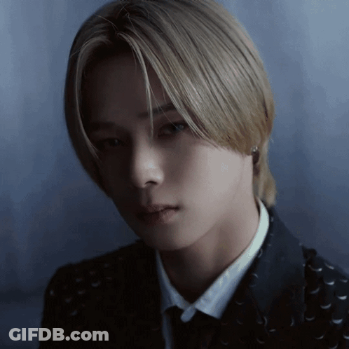 Man In Black Jacket And Tie Close Up GIF