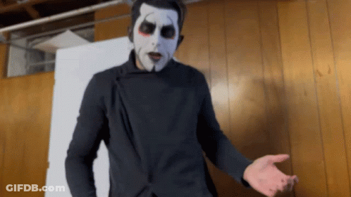 Man In Black Jacket And White Face Paint GIF