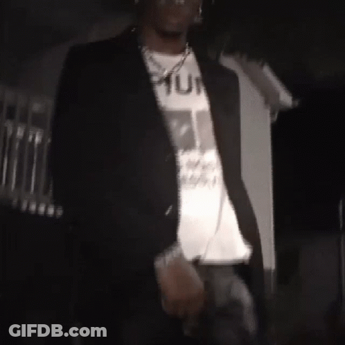 Man In Black Jacket And White T-Shirt Saying Punk GIF