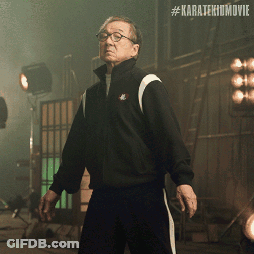 Man In Black Jacket At Karatekidmovie Sign GIF