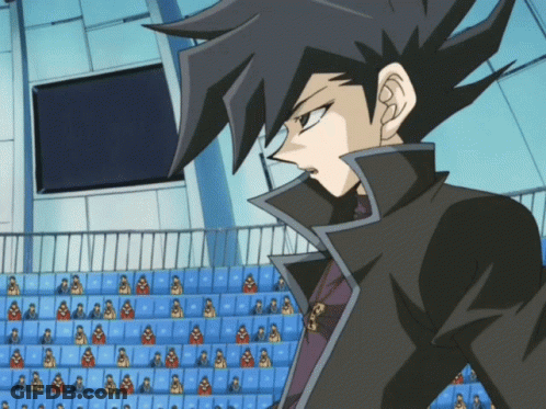 Man In Black Jacket Before Stadium Crowd GIF
