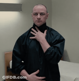 Man In Black Jacket Hand On Chest GIF